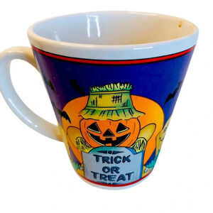 Halloween coffee mug.  ‘Trick or Treat’ scarecrow
